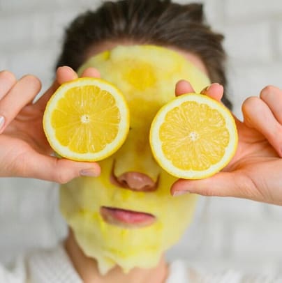 94297E65-2CEE-46FE-9779-2CCB580D5BF6 Woman with her lemon face mask