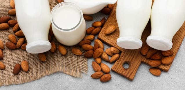 Almond milk in bottles with cover