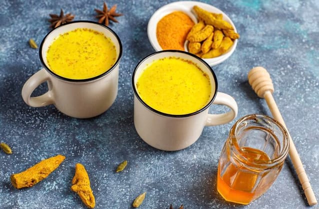 Two cups of Turmeric Lattes