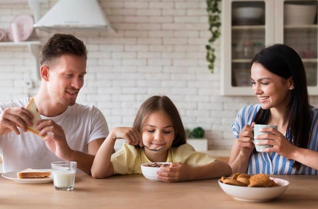 Family enjoying their almond milk 