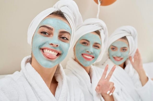 Three friend bonding and doing their face mask together