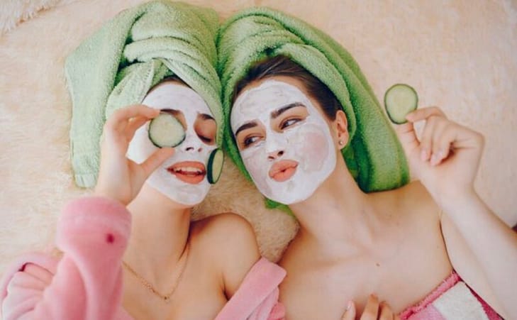 Two women enjoying their natural face mask together