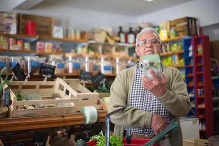 A man reading ingredient food label