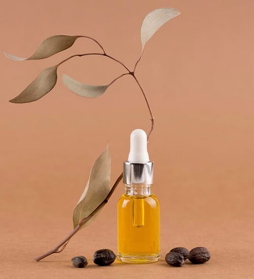 96C949C8-1333-429C-BF1E-1BE545560290 Jojoba oil in a droplet container