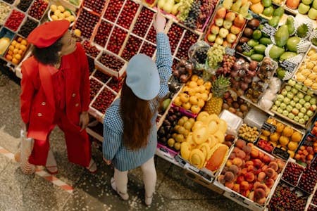 woman buying fruits in a grocery store